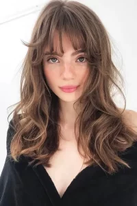 Long Brunette Hair with Wispy Bangs Model Rambut Layer yang Sesuai Dengan Jenis Rambut